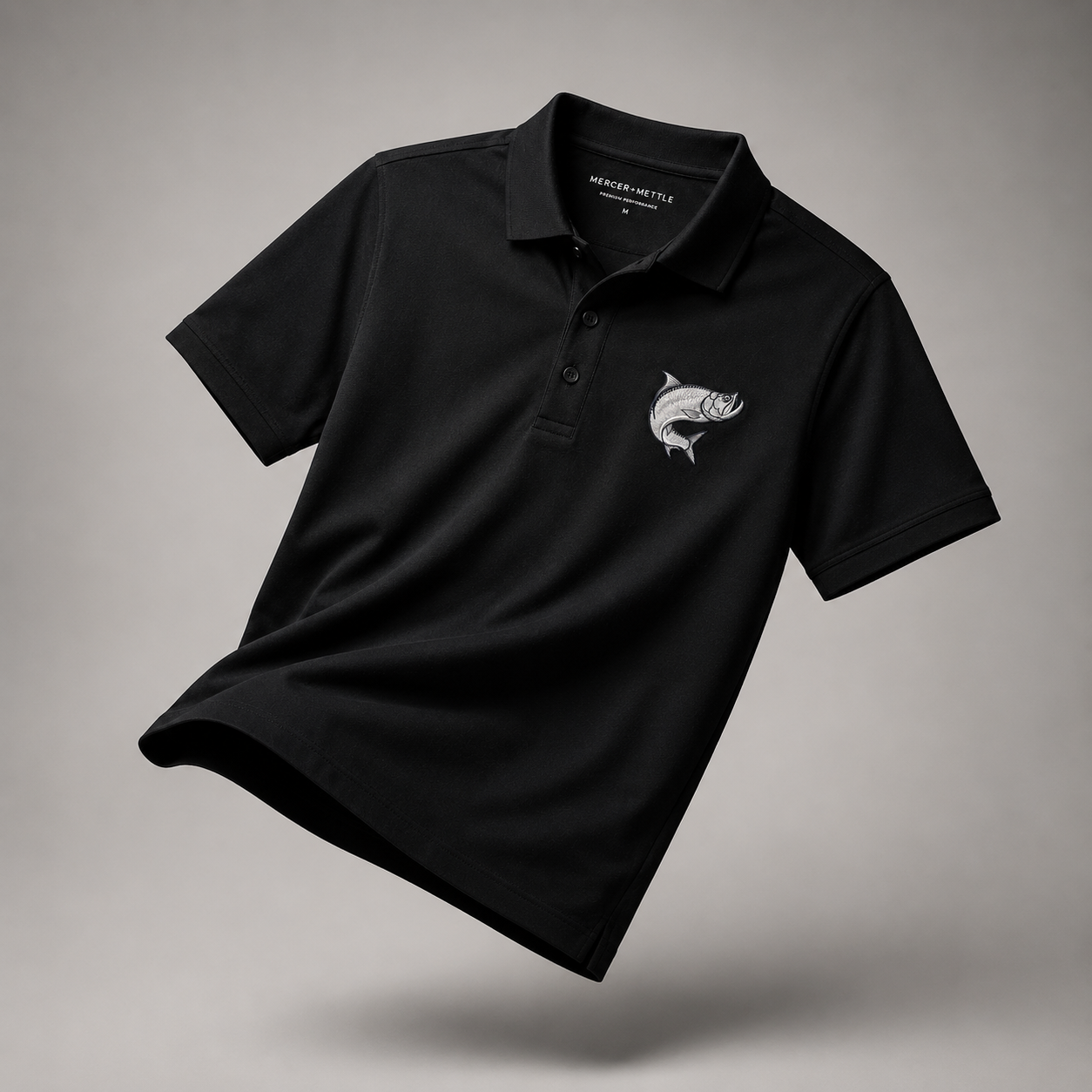 Atlantic Tarpon Premium Embroidered Polo Mercer+Mettle Luxury Coastal Golf Shirt.