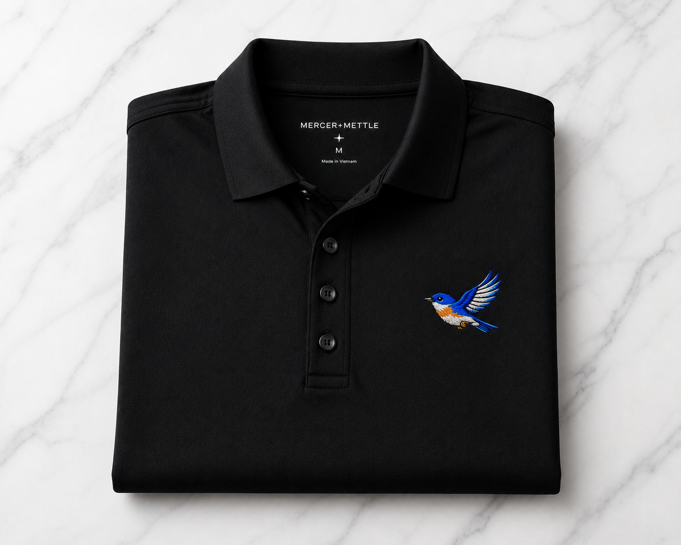 Premium Eastern Bluebird Embroidered Mercer + Mettle Performance Golf Polo Luxury Bird Lover Polo | Nature Inspired Country Club Golf Shirt.
